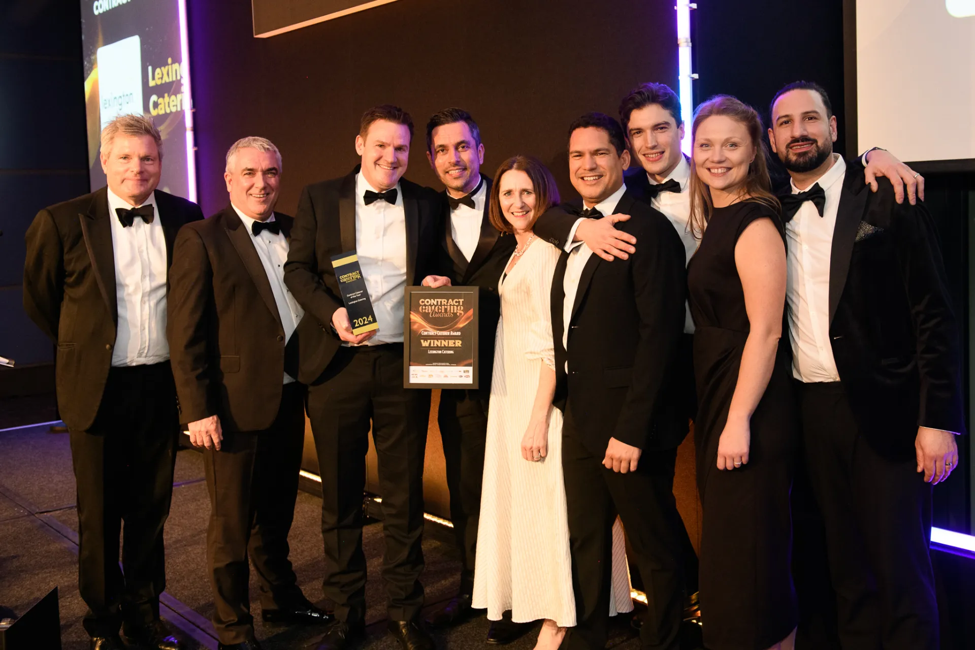 the team holding the Contract Caterer Award