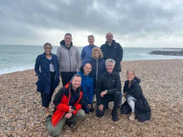 Team group picture on the beach