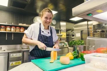 chef cutting fruits