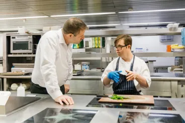 chef explaining to studernt