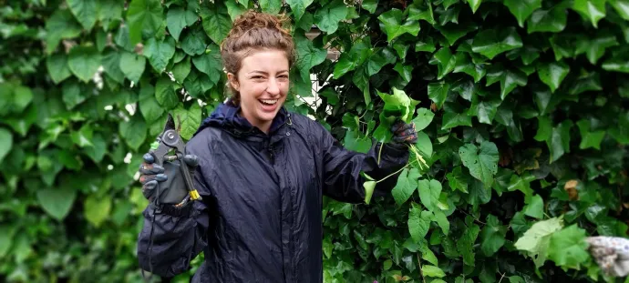 women fixing a plant